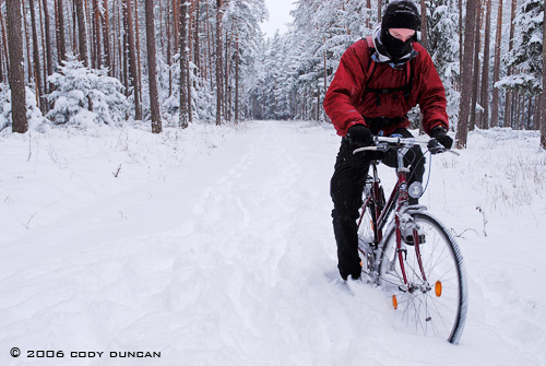 © cody duncan photography. Riding bicycle in snow, germany
