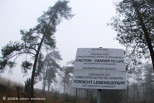 © Cody Duncan photography.  warning sign at border of American army base in Germany