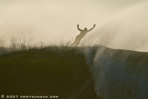 surfer bailing from large wave, Rincon