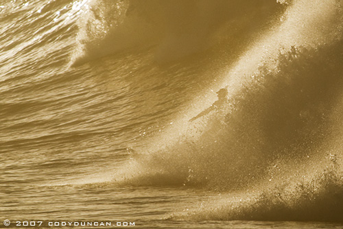 surfer in large wave, rincon