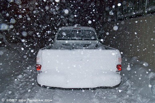 © cody duncan photography.  Snow covered truck in storm