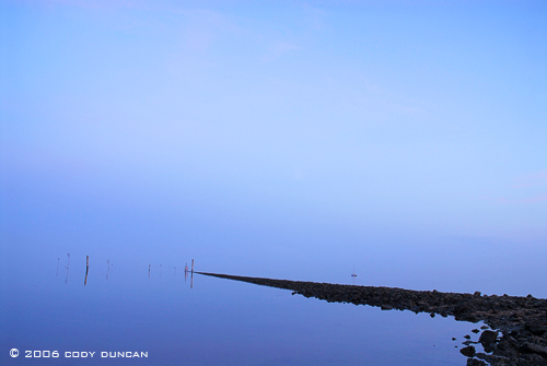 Reflection in wadden sea, wattenmeer, harbor during lowtide, Juist, Germany. © Cody Duncan Photography