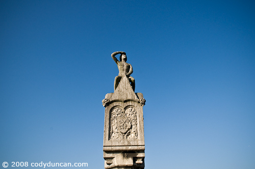 German travel photo: statue of watchman on stone bridge over Danube, Regensburg, Germany. © Cody Duncan Photography