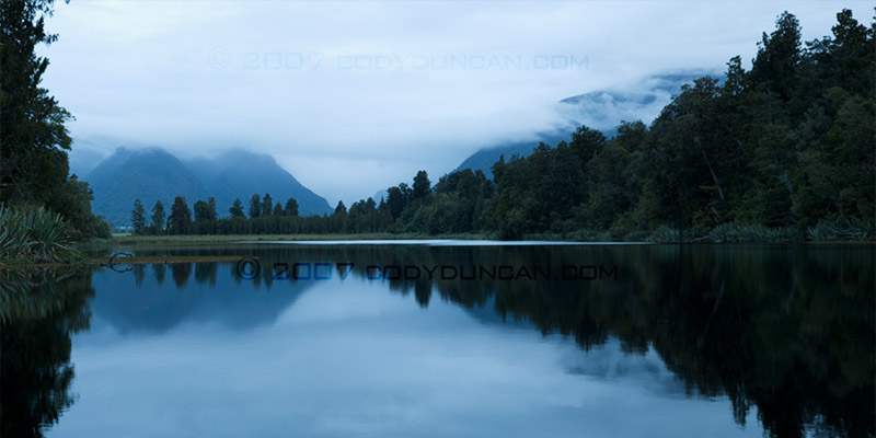 New Zealand Stock landscape Photo: reflection in Lake Matheson, New Zealand.  © Cody Duncan photography
