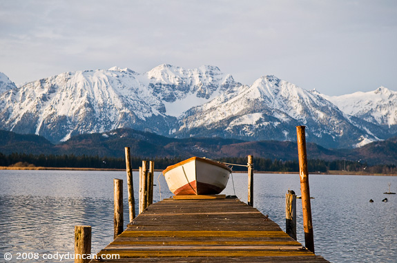 Cody Duncan Stock Photography: Row boat of wooden dock at Hopfensee, Bavaria, Germany. © Cody Duncan Photography