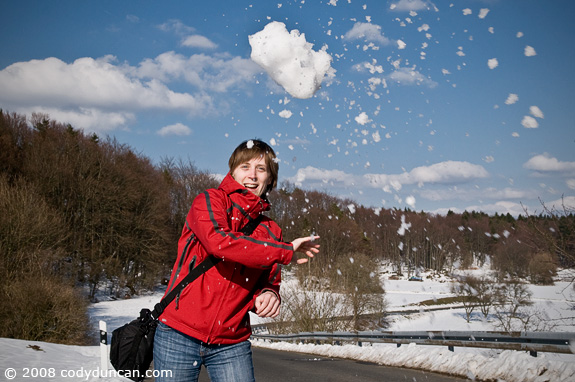 Cody Duncan Stock Photography: female throwing snowball, Germany. © Cody Duncan Photography