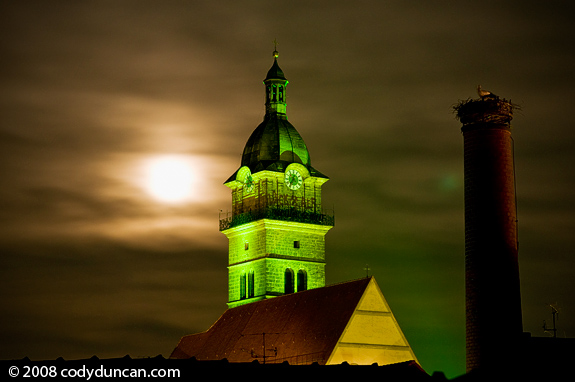 Full moon and Church at night, Bavaria, Germany. Cody Duncan travel stock photography