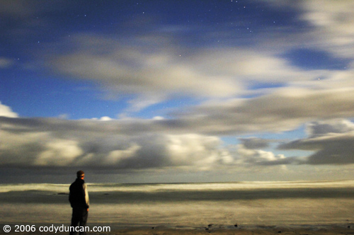Stock travel Photo: Watching the sea under full moon on west coast beach, New Zealand. © Cody Duncan photography