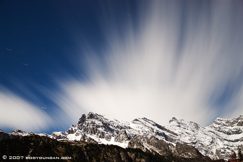 Cody Duncan Travel Photography: Night clouds and passing over mountains in Bernese alps of Switzerland. © Cody Duncan Photography