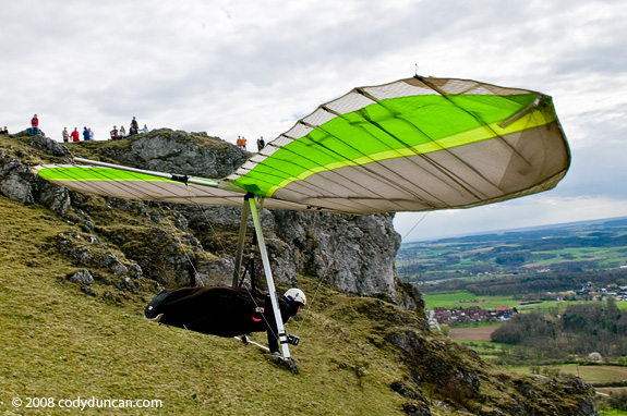 Hang glider taking flight, Walberla, Germany. Cody Duncan travel stock photography