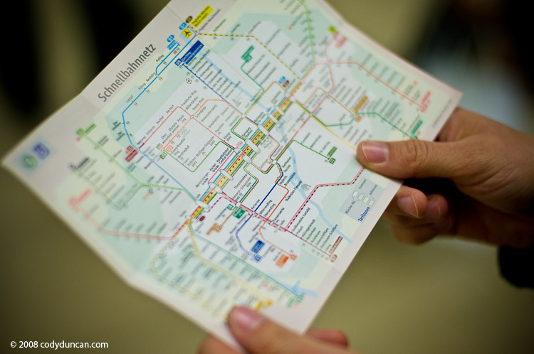 German travel stock photo: Hands holding Munich subway map. Cody Duncan photography