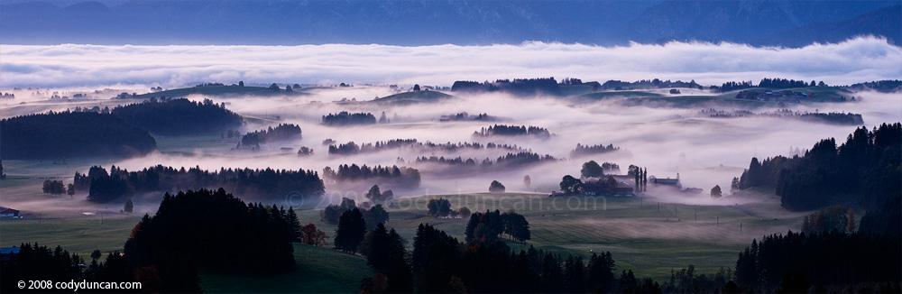Panoramic stock images: Autumn mist at dawn in the Allgaeu region of Bavaria, Germany. Cody Duncan travel photography