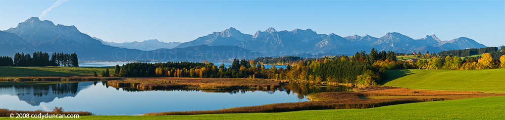Germany stock travel photography: panoramic photo of Forggensee and Allgaeu mountains in autumn