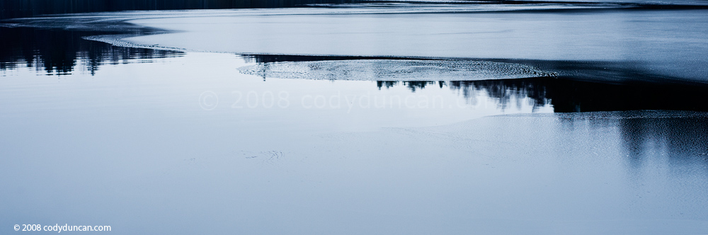 Panoramic stock photo: Germany, Oberpfalz; partially frozen pond in early winter. Cody Duncan Photography