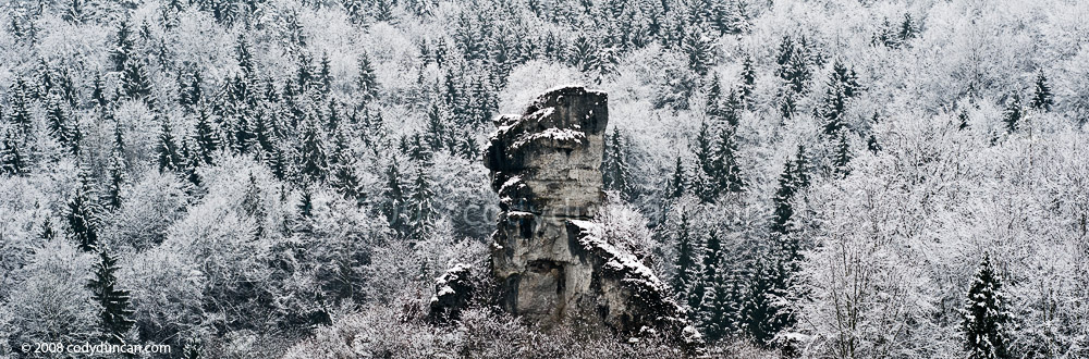 German travel stock photo: forest and limestone rock formation in Franconian Switzerland, winter panoramic photo. Cody Duncan photography