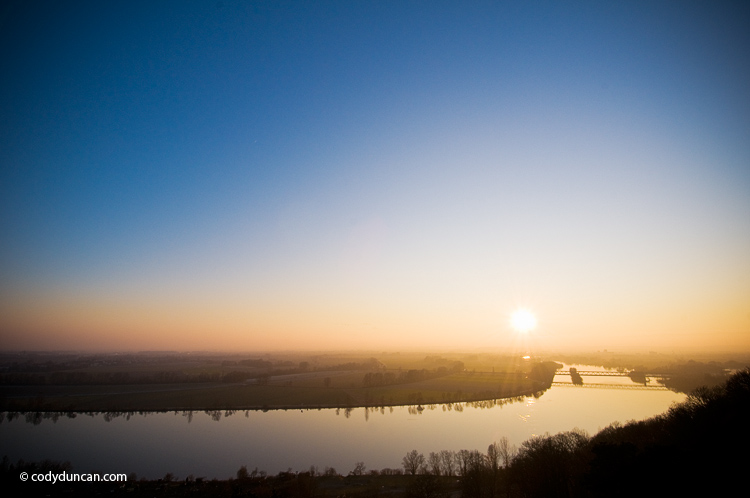 Winter sun sets over Danube river as seen from Walhalla temple, Regensburg, Oberpfalz, Bavaria, Germany. Cody Duncan travel photography