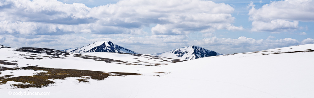 Panoramic landscape stock photography: Cairngorm mountains with spring snow, Cairngorms, Scotland