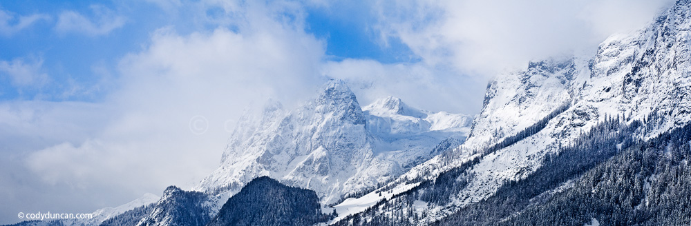German panoramic stock photo: winter storm clears over mountains of Berchtesgaden national park, Bavaria, Germany