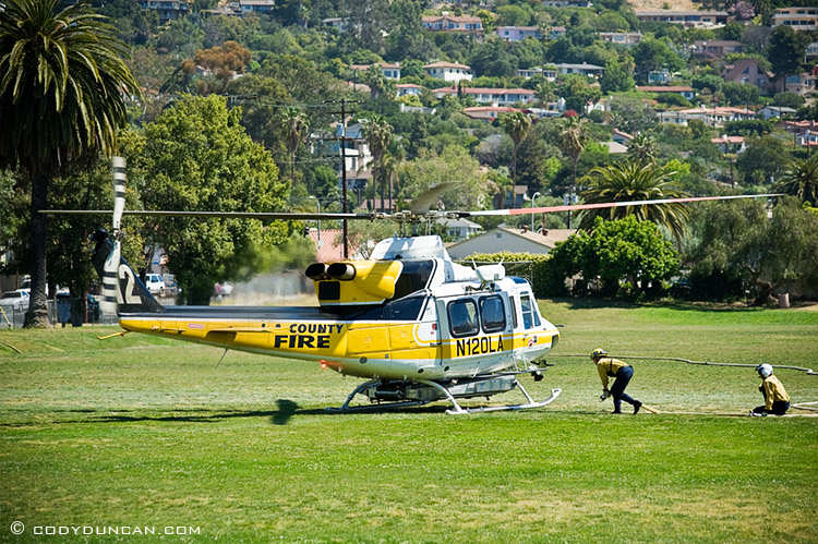 LA county fire helicopter filling with water at Santa Barbara Jr. High School during Jesusita fire, May 6 2009