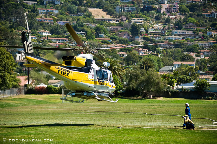 LA county fire helicopter lifting off from Santa Barbara Jr. High School during Jesusita fire, May 6 2009