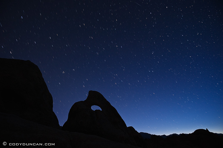 NIght photography Nikon d700: star trails over rock formations, Alabama Hills, California