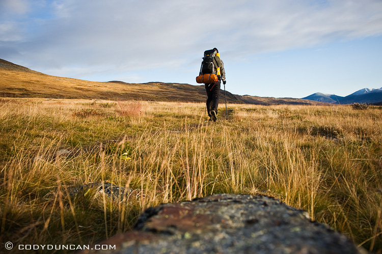 Outdoor lifestyle photo - Solo hiker on Kungsleden trail, Lapland, Sweden