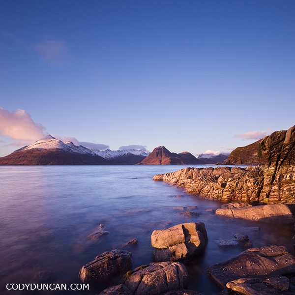 Travel stock image: Rocky coast at Elgol with Cuillins in background, Isle of Skye, Scotland