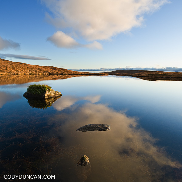 Reflection in lochan, Black Cuillin hills, Glenbrittle, Isle of Skye, Scotland
