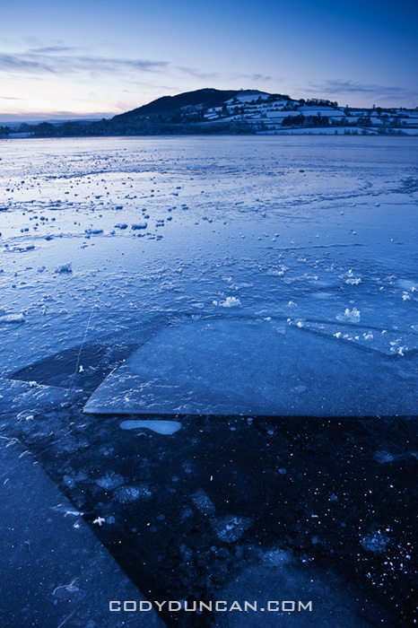 Ice covers Llangorse lake at dawn, Brecon Beacons naitonal park, Wales