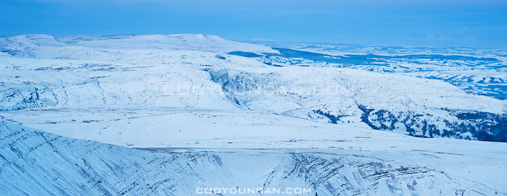 Winter view from summit of Pen Y Fan towards Black Mountains in west, Brecon Beacons national park, Wales